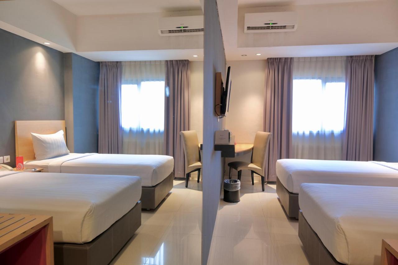 Отель @Hom Semarang Simpang Lima Экстерьер фото